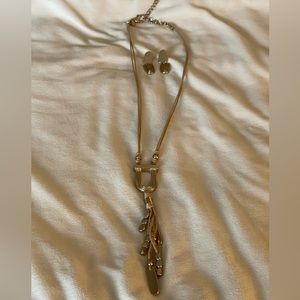 Chico’s brushed gold pendant necklace with matching earrings